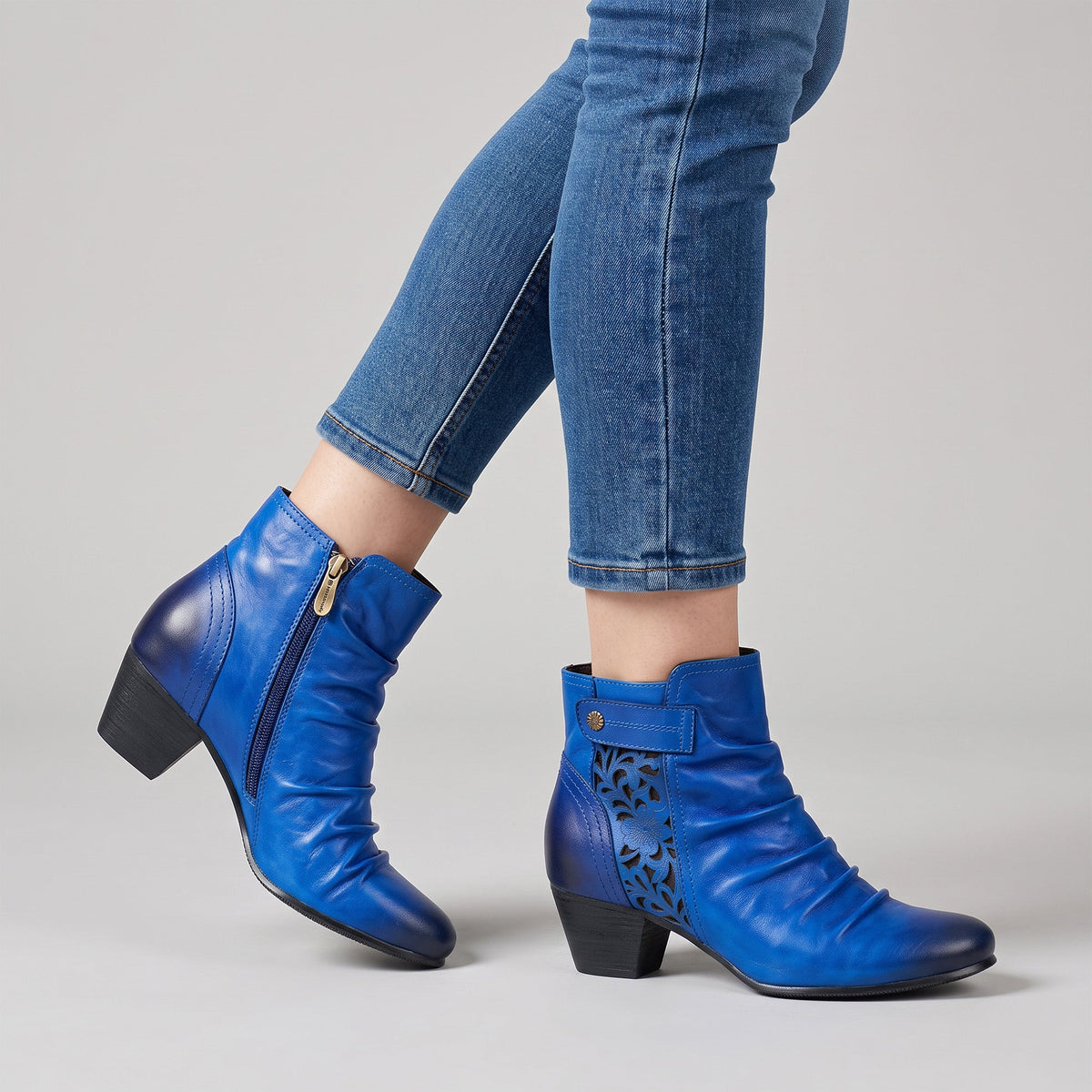 ROYAL BLUE LEATHER FLORAL CUTOUTS ANKLE BOOTS