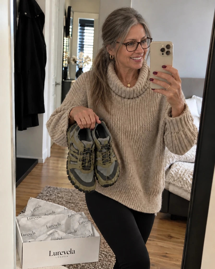 Customer holding olive Lurevela barefoot shoes in a mirror selfie