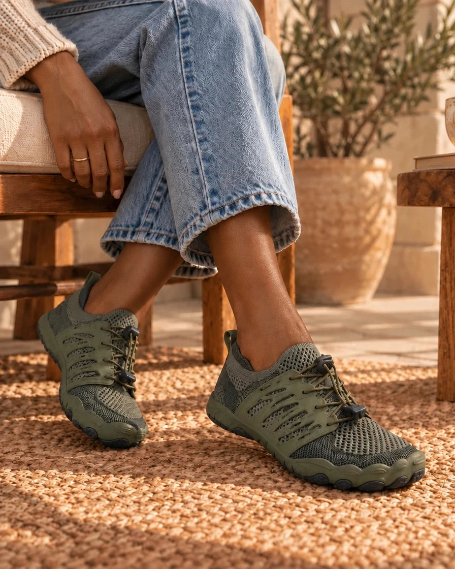 Olive green Lurevela barefoot shoes worn with jeans